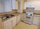 Efficient kitchen with ample cabinetry and modern appliances at 18001 Richmond Place Dr # 721, Tampa, FL 33647