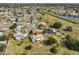 Aerial view highlighting home's location in a residential community at 1807 Pineapple Palm Ct, Sun City Center, FL 33573