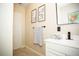 Modern bathroom with white vanity and updated fixtures at 1913 E Wilder Ave, Tampa, FL 33610