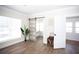 Living room showcasing a vinyl floor and sliding barn door at 1913 E Wilder Ave, Tampa, FL 33610