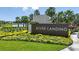 River Landing entrance with lush landscaping and signage at 2001 Longliner Loop, Wesley Chapel, FL 33543