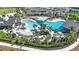 Resort-style pool with plenty of lounge chairs and shade structures at 2001 Longliner Loop, Wesley Chapel, FL 33543