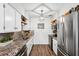 Modern kitchen with stainless steel appliances and granite countertops at 218 W Seneca Ave, Tampa, FL 33612