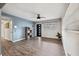 Light and airy living room with hardwood floors and lots of natural light at 218 W Seneca Ave, Tampa, FL 33612