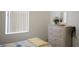 Bedroom with twin bed and dresser at 2182 Acadia Greens Dr # 66, Sun City Center, FL 33573