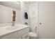 Clean and bright bathroom with white vanity and updated fixtures at 2424 W Tampa Bay Blvd # C212, Tampa, FL 33607