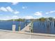 Wooden dock with boat slips on calm water at 2424 W Tampa Bay Blvd # C212, Tampa, FL 33607