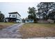 Property view showing a bungalow and a modern home at 2480 18Th N Ave, St Petersburg, FL 33713