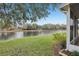 View of canal from screened porch at 2552 Glenrise Pl, Wesley Chapel, FL 33544