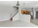 Dining room with kitchen and staircase at 2552 Glenrise Pl, Wesley Chapel, FL 33544