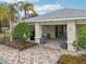 Community pool area with covered seating and landscaping at 2552 Glenrise Pl, Wesley Chapel, FL 33544