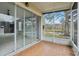 Screened porch with canal view at 2552 Glenrise Pl, Wesley Chapel, FL 33544