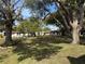 View of community buildings and landscaping at 3115 Mission Grove Dr, Palm Harbor, FL 34684