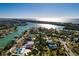 Aerial view of a house nestled in a waterfront community, highlighting its unique location and surroundings at 3118 S Maritana Dr, St Pete Beach, FL 33706