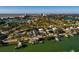 Wide aerial view of a waterfront house and neighborhood at 3118 S Maritana Dr, St Pete Beach, FL 33706