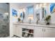 Spa-like Primary bathroom with double vanities, a large shower, and plenty of storage at 335 Bath Club S Blvd, North Redington Beach, FL 33708