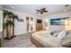 Spacious main bedroom with private balcony access, hardwood floors, and plenty of natural light at 335 Bath Club S Blvd, North Redington Beach, FL 33708