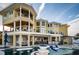 Multi-story waterfront home with balconies and expansive views at 335 Bath Club S Blvd, North Redington Beach, FL 33708