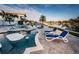 Luxury pool with swim-up bar and lounge chairs, overlooking the water at 335 Bath Club S Blvd, North Redington Beach, FL 33708