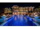 Resort-style pool with fire features and swim-up bar at 335 Bath Club S Blvd, North Redington Beach, FL 33708