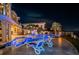 Relaxing pool area with lounge chairs at night at 335 Bath Club S Blvd, North Redington Beach, FL 33708