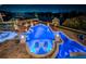 Luxurious waterfront pool with spa and fire features at 335 Bath Club S Blvd, North Redington Beach, FL 33708