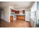 Kitchen with wood cabinets and tile floors at 3712 56Th N Ave, St Petersburg, FL 33714