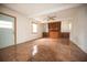 Living room with tile floors and wood accent wall at 3712 56Th N Ave, St Petersburg, FL 33714