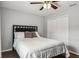 Bedroom with a queen bed, wood floors, and ceiling fan at 3745 Hillview Ct, Land O Lakes, FL 34639