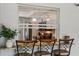 View of kitchen with granite countertop and modern appliances from breakfast bar at 3745 Hillview Ct, Land O Lakes, FL 34639