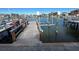 Private dock with boat lift and kayak storage at 439 Boca Ciega Point N Blvd, St Petersburg, FL 33708