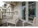 Relaxing balcony with outdoor furniture and city views at 450 Knights Run Ave # 415, Tampa, FL 33602