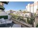 Outdoor balcony space with seating and city views at 450 Knights Run Ave # 415, Tampa, FL 33602