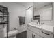 Modern bathroom with white cabinets and hexagonal tile floor at 450 Knights Run Ave # 415, Tampa, FL 33602