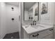 Modern bathroom with white subway tiles, hexagon floor tiles, and a floating vanity at 450 Knights Run Ave # 415, Tampa, FL 33602