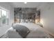 Bright bedroom with a king-size bed and accent wall at 450 Knights Run Ave # 415, Tampa, FL 33602