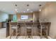 Modern community bar with seating for residents at 450 Knights Run Ave # 415, Tampa, FL 33602