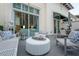 Private patio with seating area, coffee table, and city view at 450 Knights Run Ave # 415, Tampa, FL 33602