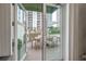 Private patio with outdoor furniture and city view at 450 Knights Run Ave # 415, Tampa, FL 33602