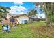 Large backyard with playset and seating at 4604 Westford Cir, Tampa, FL 33618