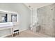 Bathroom boasts a large walk-in shower, modern vanity, and stylish tile work at 4604 Westford Cir, Tampa, FL 33618