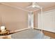 Bedroom with white closet doors and wood floors at 4604 Westford Cir, Tampa, FL 33618