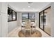 Bright dining area with sliding glass doors leading to the pool at 4604 Westford Cir, Tampa, FL 33618