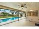 Inviting pool area with screened enclosure at 4604 Westford Cir, Tampa, FL 33618