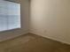 Bedroom with carpeted floor and window blinds at 5125 Palm Springs Blvd # 10303, Tampa, FL 33647