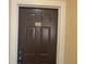 Condo front door with number 303 at 5125 Palm Springs Blvd # 10303, Tampa, FL 33647