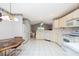 View of kitchen with breakfast nook and living room at 5147 Sterling Manor Dr, Tampa, FL 33647