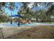 playground with shade structure and play equipment at 5147 Sterling Manor Dr, Tampa, FL 33647