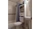 Clean bathroom featuring a shower/tub combo and storage at 5745 40Th N Ave # 152B, St Petersburg, FL 33709