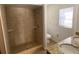 Updated bathroom with shower and double vanity at 6802 Seaview Way, Tampa, FL 33615